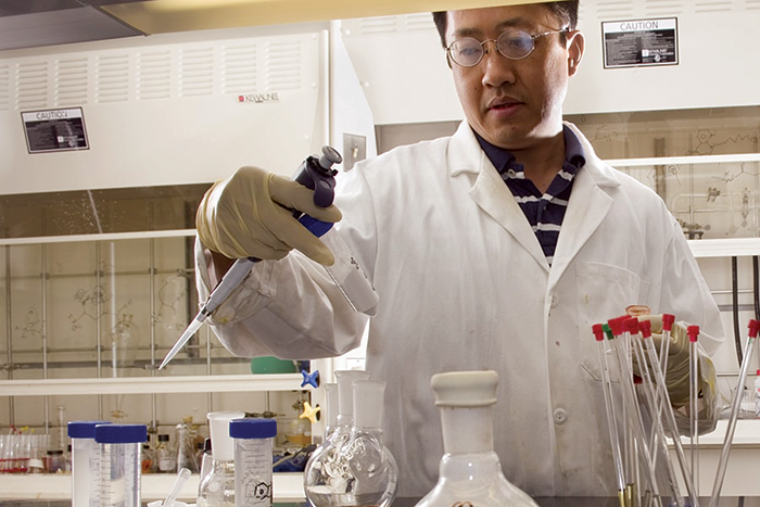 Danith Ly, professor of chemistry, Mellon College of Science, in the lab