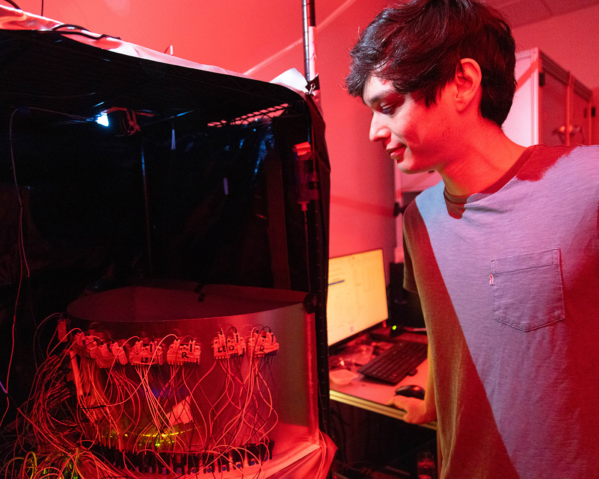 Kevin Wright, a University Pittsburgh PhD student working in the Yttri Lab monitors an ongoing experiment on learning and decision making at the Yttri Lab at the Mellon Institute