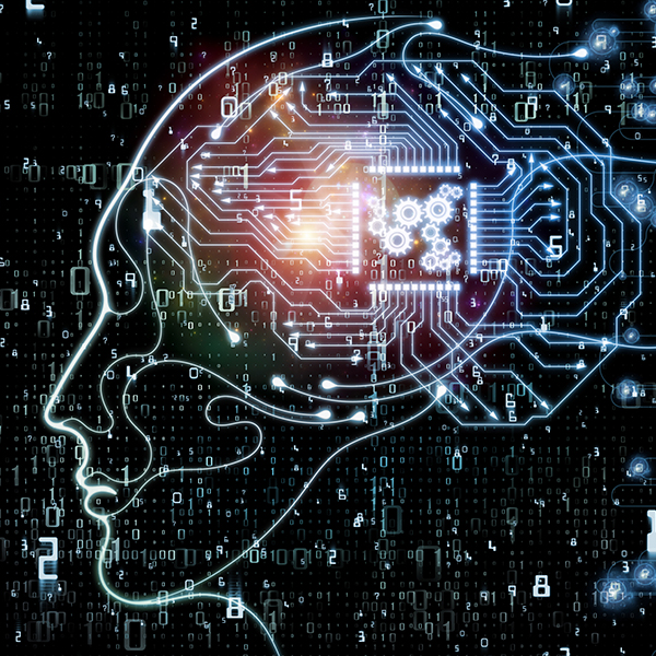 machine learning concept of code and computer hardware creating the outline of a human head