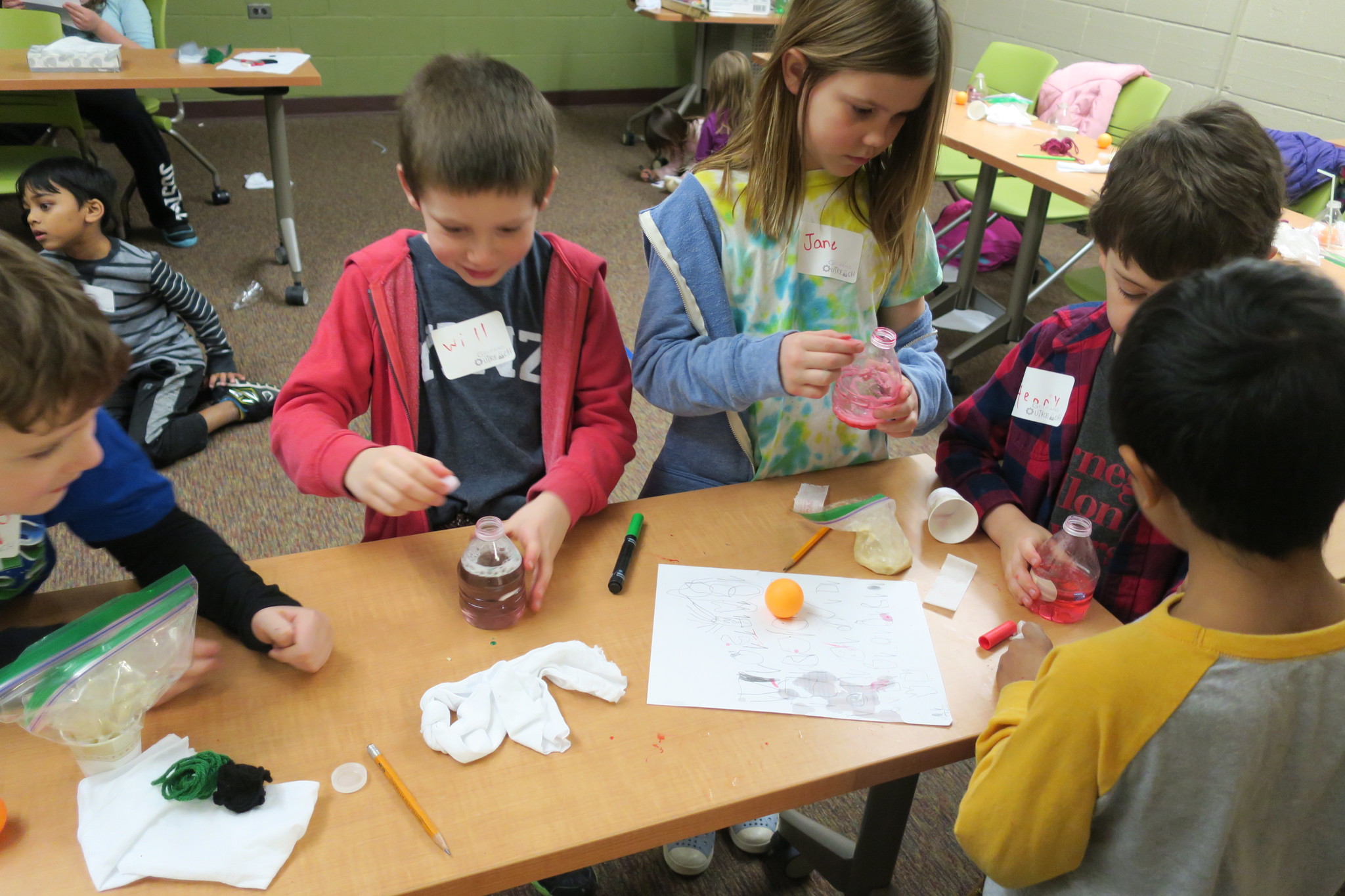 Students make models of the digestive track.