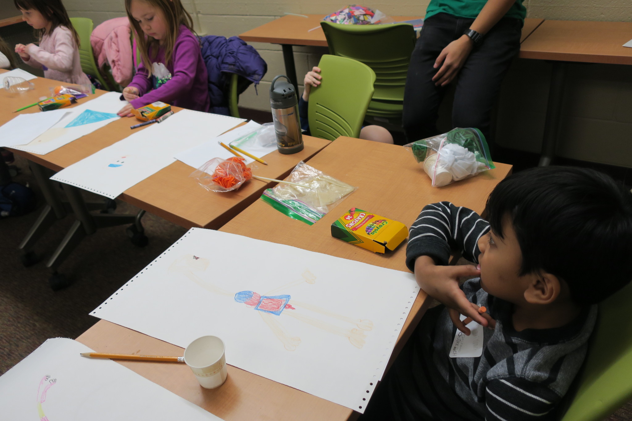 Students draw the digestive track.