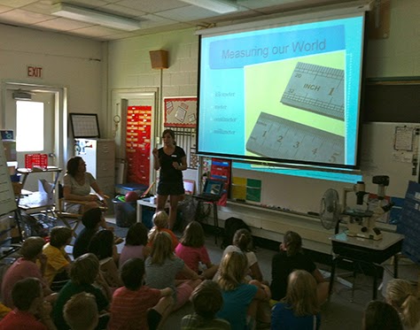 Dr. Zheng presents at Corl Street Elementary.