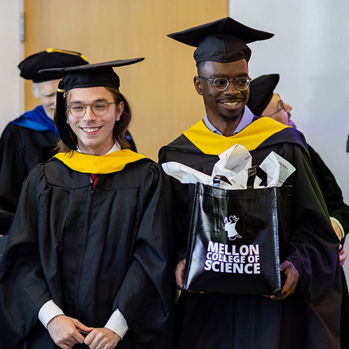 Student walks in commencement