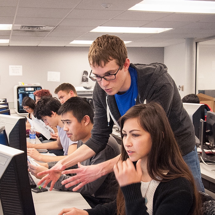 students collaborating in a lab