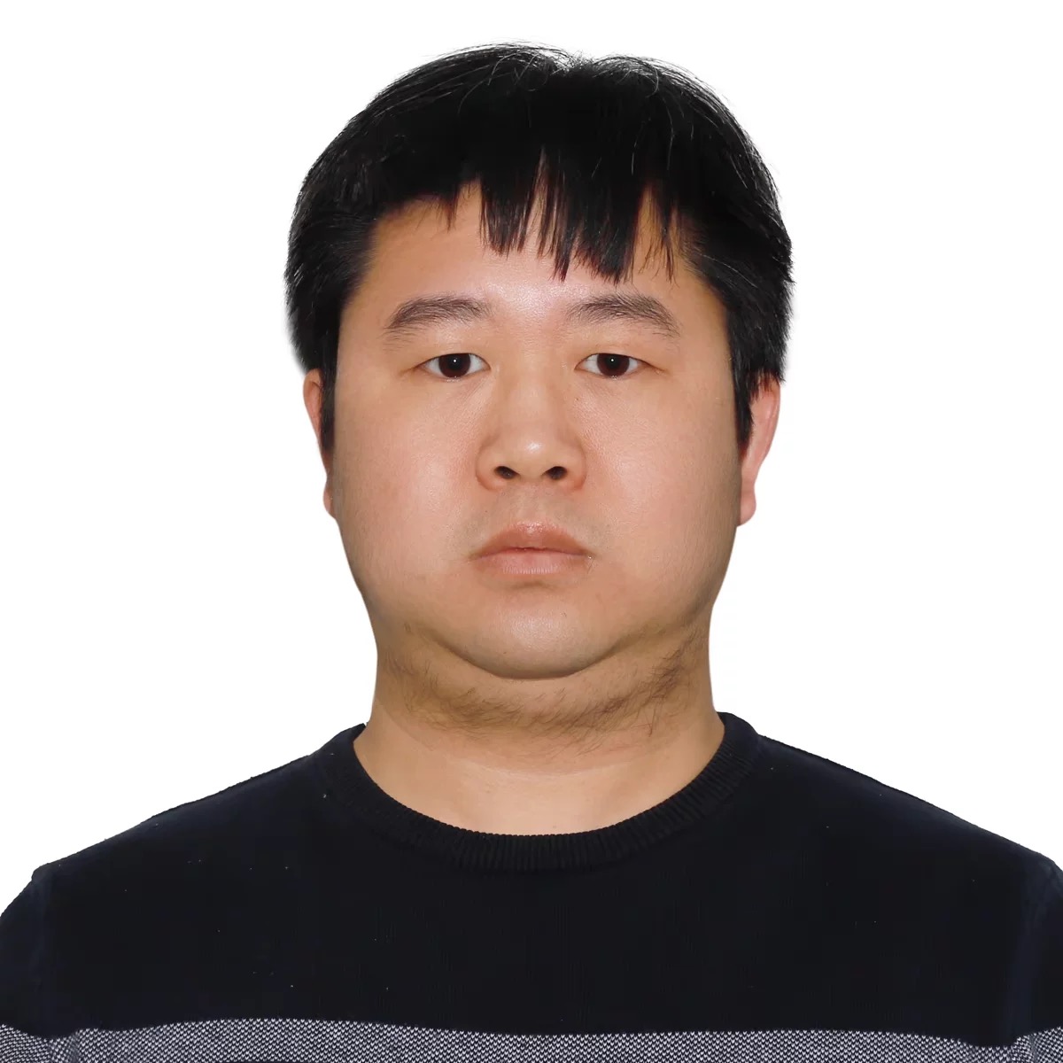 headshot of a black haired man wearing a black sweater