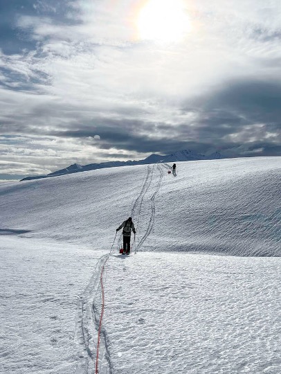 Brandon Tober leads ice thickness survey on Root Glacier in Alaska
