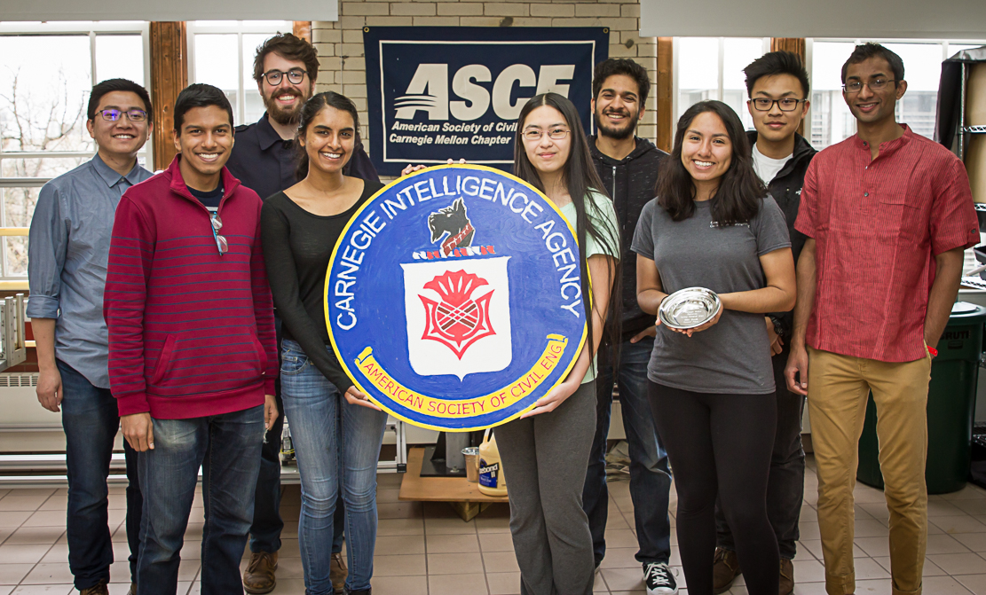 ASCE members pose with their trophy