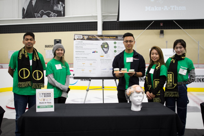 Ryan Rusali holds part of his team’s prototype for a safer hockey helmet at the 2019 Rethink the Rink competition