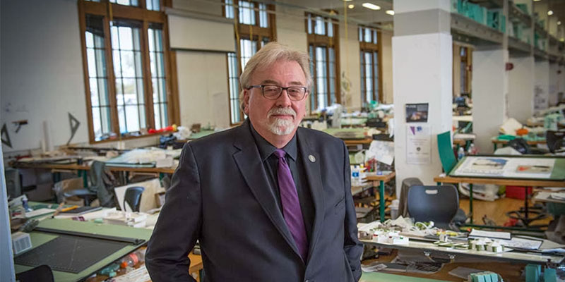 Headshot of Dan Martin in an architecture studio.