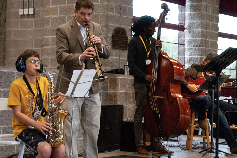 a group of students playing instruments