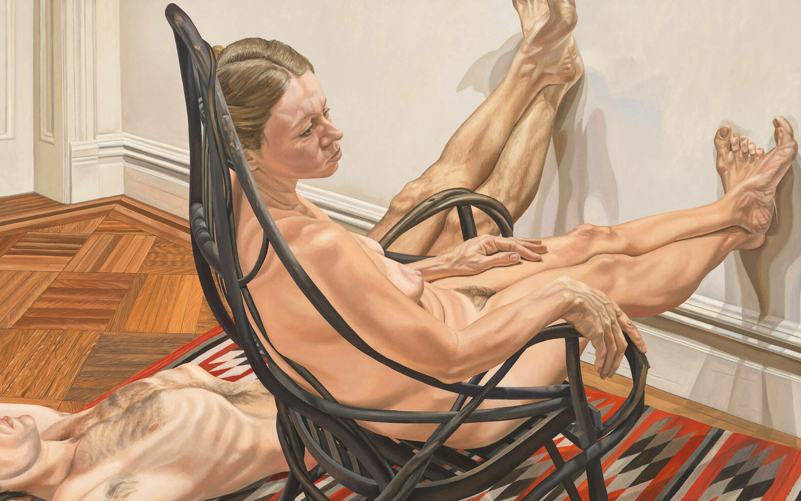 Pearlstein nude painting of a woman in an adirondack chair and a man laying on a nearby rug.