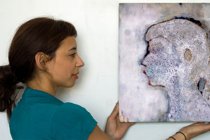 Photo of Joana with a self portrait