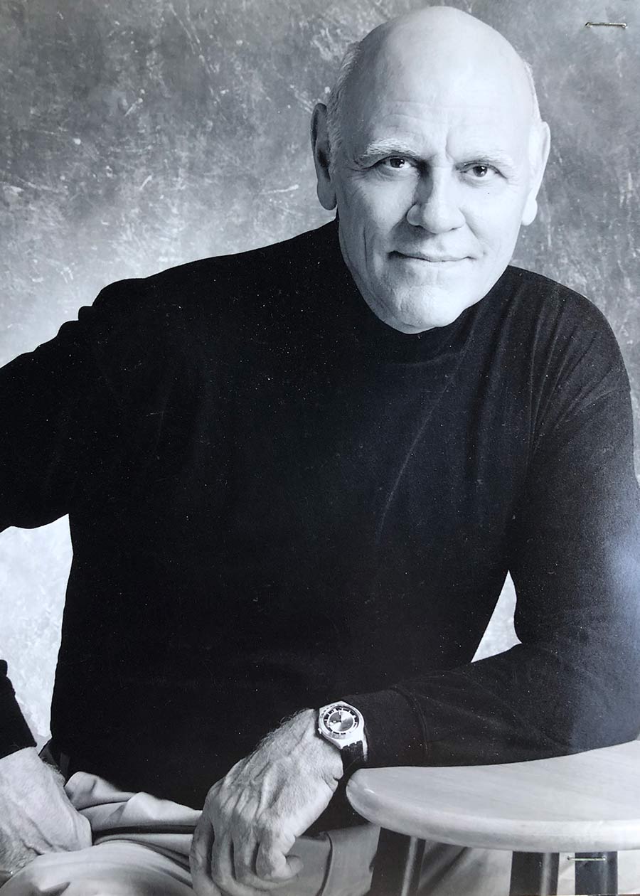 Black and white headshot of John Bracchitta Braden.