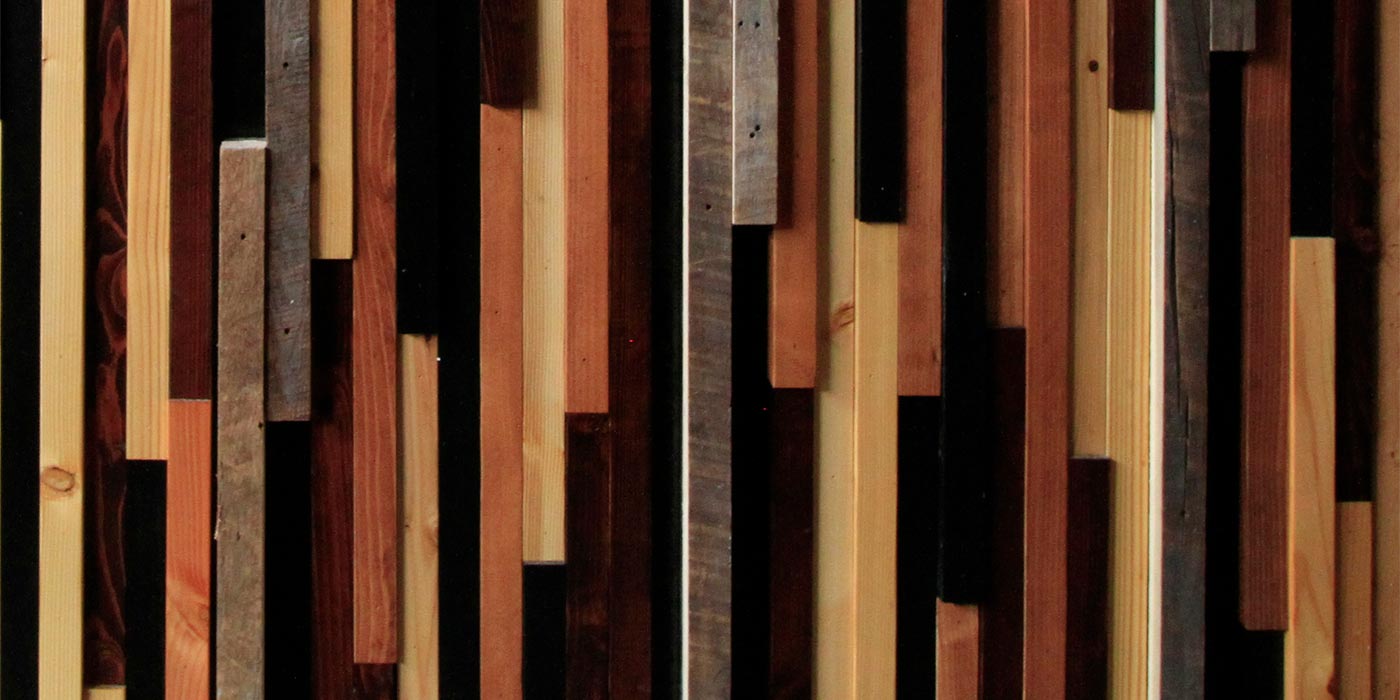 Close detail shot of thin strips of differently stained wood