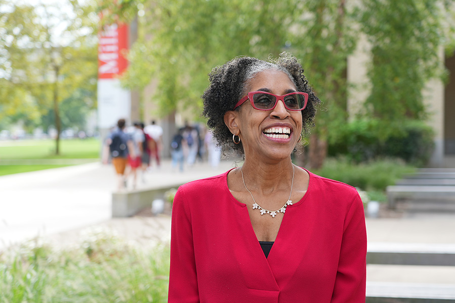 Erica Cochran Hameen on CMU campus, smiling during her interview