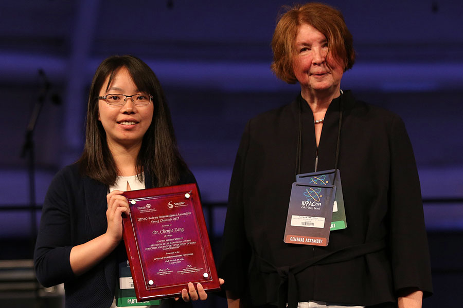 Chenjie Zeng being presented with the IUPAC award