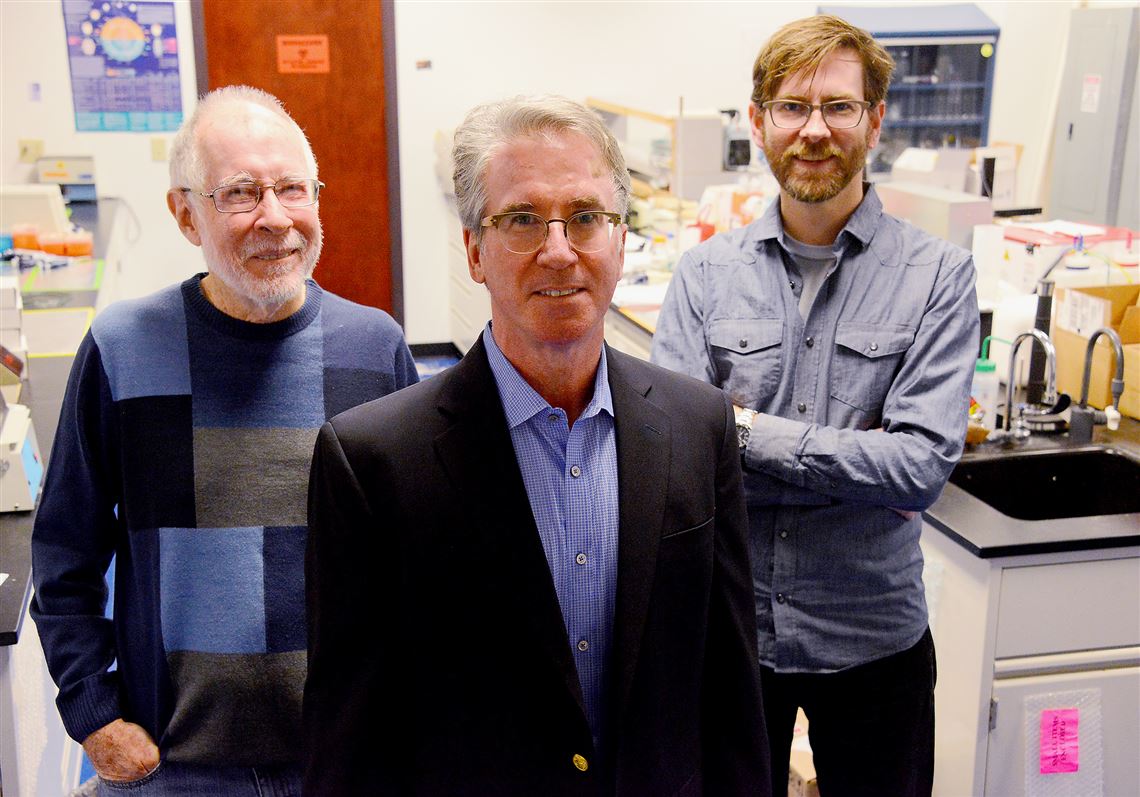 Scott Sneddon, center, and  Alan Waggoner, left, and Marcel Bruchez