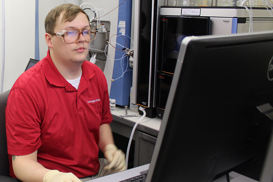 Logan Plath operating mass spectrometer