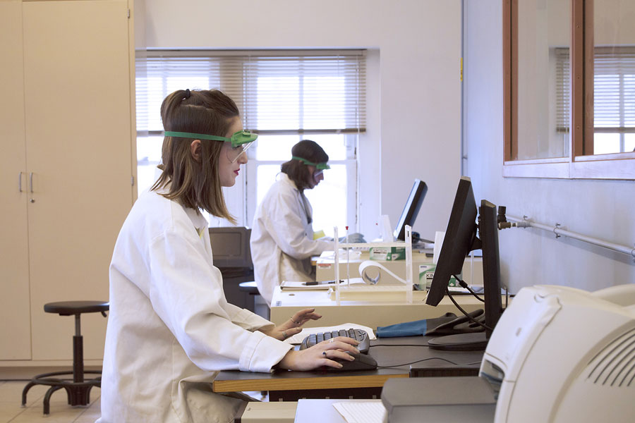 Female students at computers in laboratory