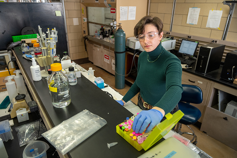 Photo of a female student in a lab
