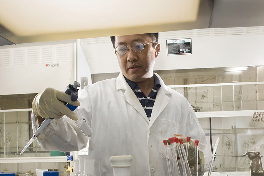 CMU chemistry professor Danith Ly in a lab setting