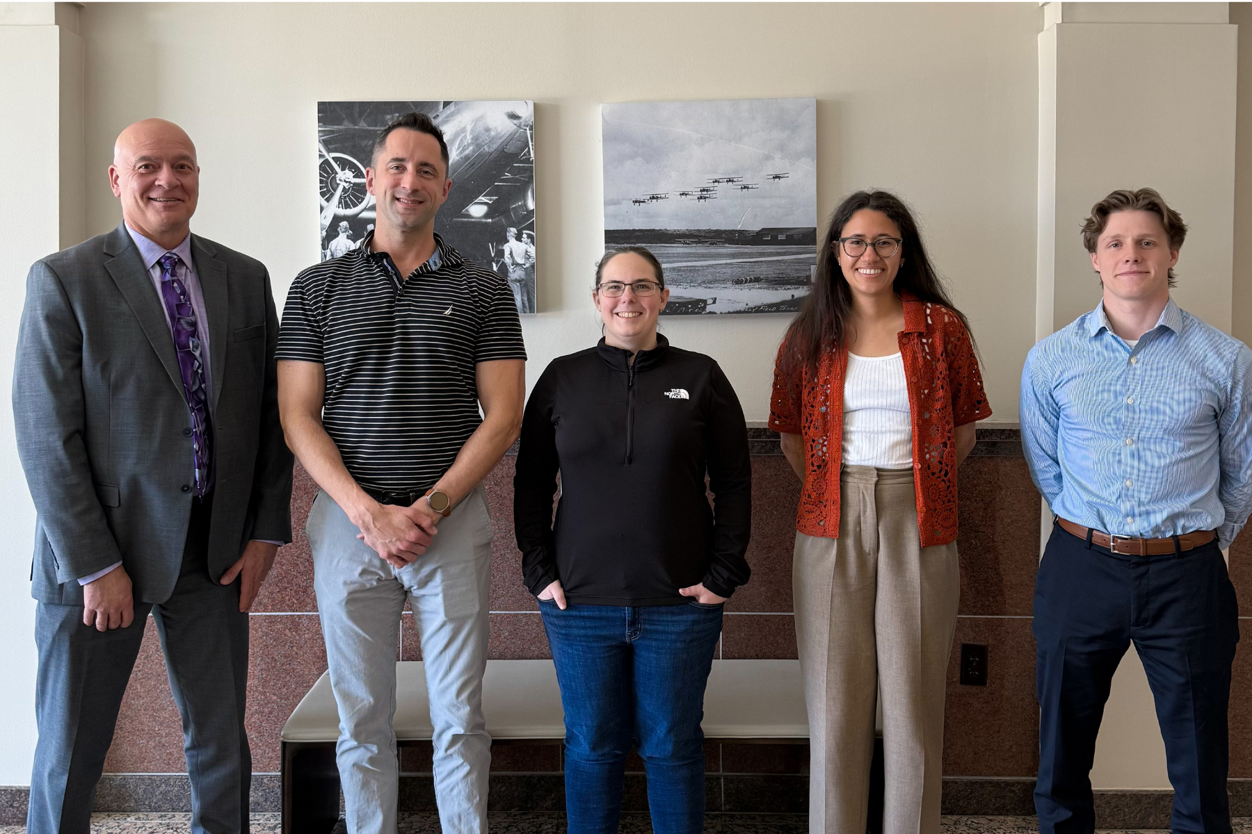 Higher headquarters leadership: Mr. Brian Cook, Chief Warrant Officer 2 Gregory Waxmonsky, Major Gabrielle M. Nesburg, Ms. Katie Robinson, and Mr. Drew Lund