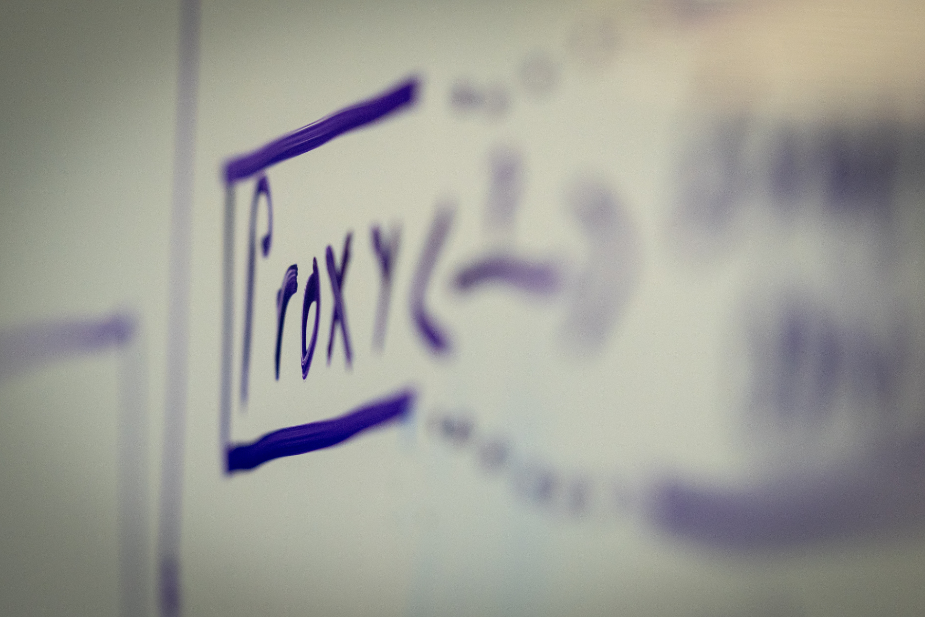 Close-up shot of whiteboard during the HACKATHON 26-1 event in San Antonio, TX.