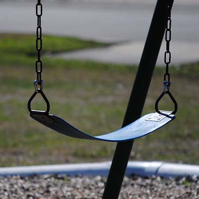 a photo of a swingset