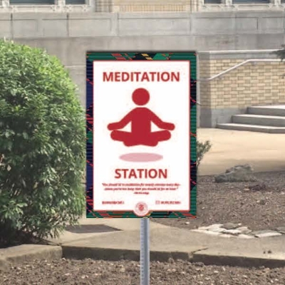 A photo of a meditation sign