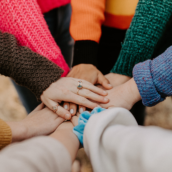 Photo of hands on top of each other