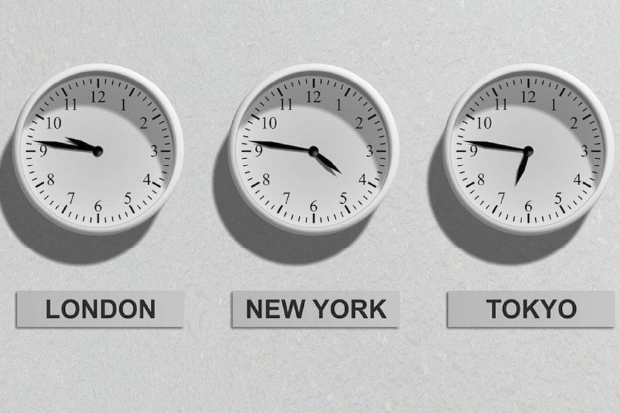 An image of multiple analog clocks with times listed from around the world.