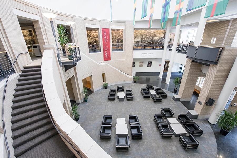 Photo of Kirr Commons featuring left staircase and Black Chairs