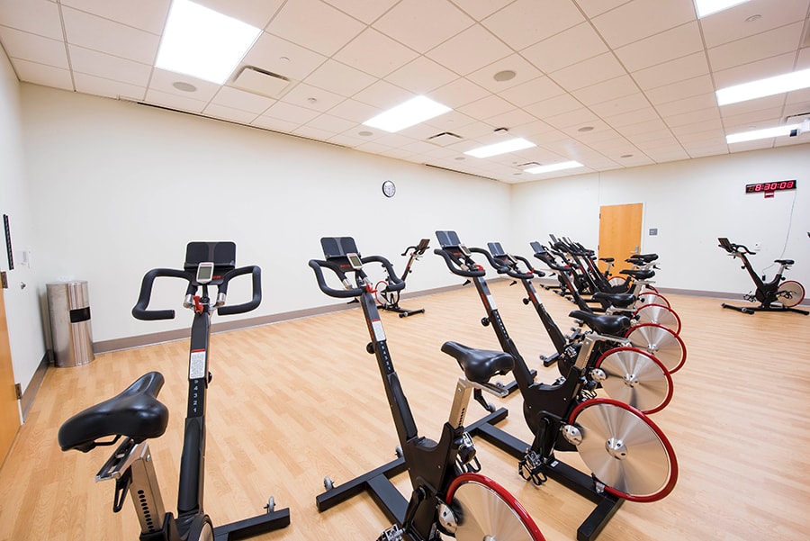 Photo of Cycling Studio with view of adjustable seats and handlebars