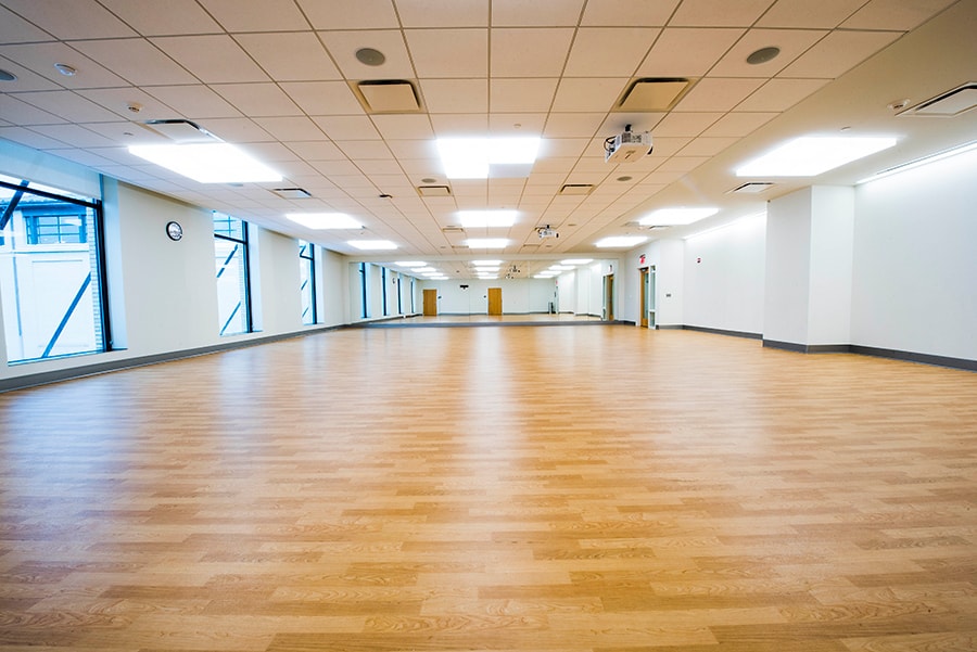 Photo of Askwith Kenner Exercise Studio with view from back of room towards mirrors