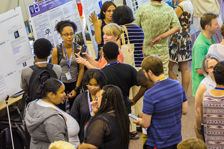 Image of students at a poster session