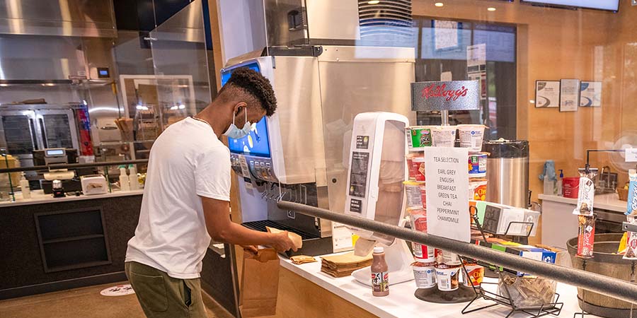 CMU student picking up food to go