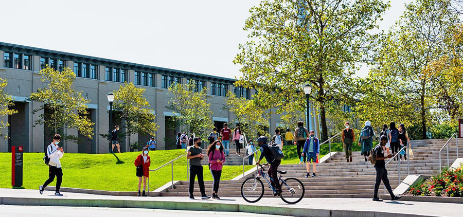 cmu-students-outside-on-campus-with-facial-coverings_900-min.jpg