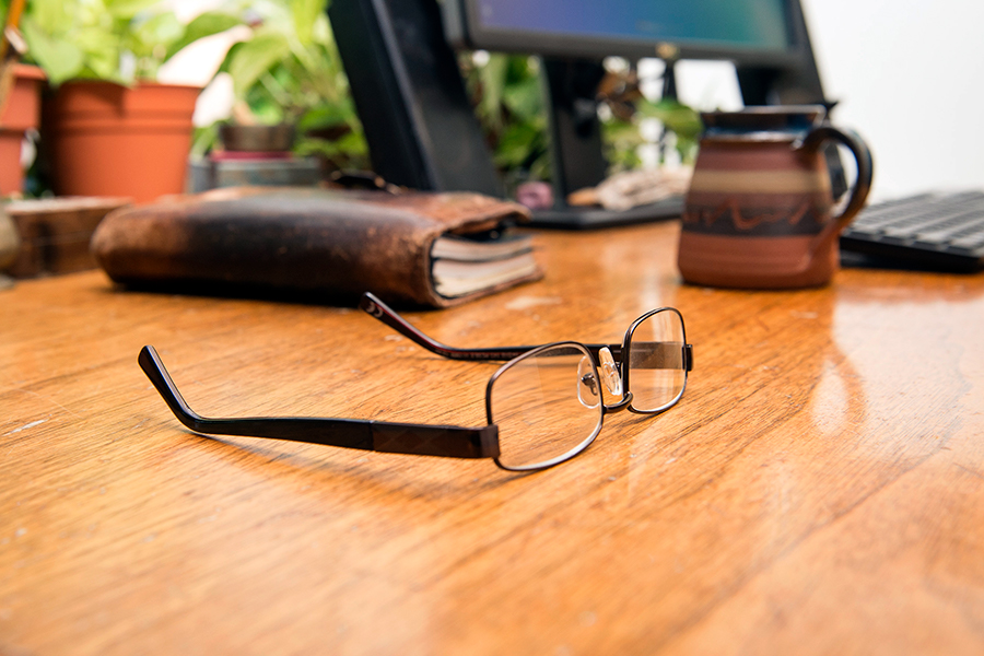 photo of glasses on desk