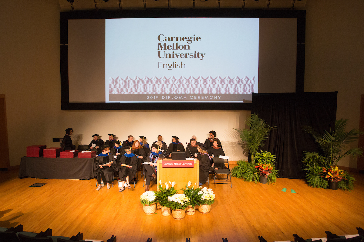 Stage at McConomy Auditorium in the Cohon University Center, set for English Diploma Ceremony.