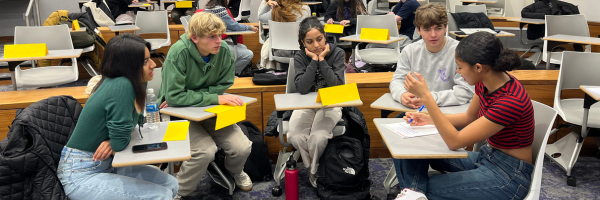 Students collaborate in a group