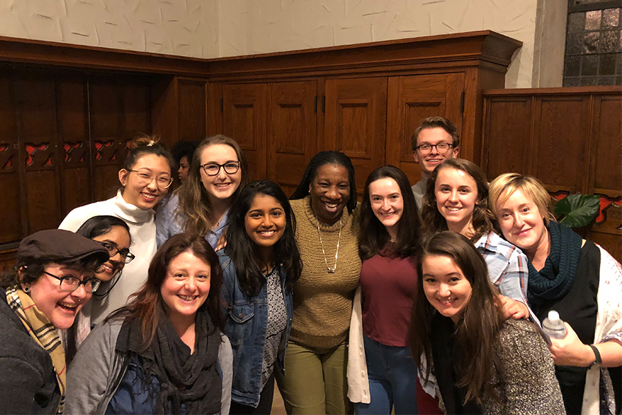 a group of students posing with the instructor for a photo