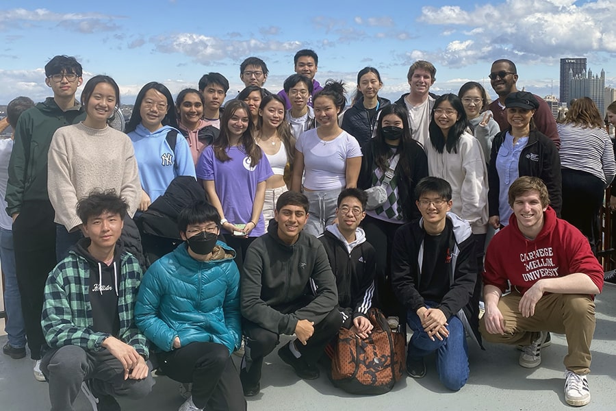 students pose for a photo on Mt. Washington