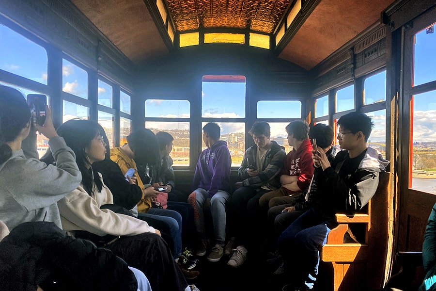 students riding the Incline