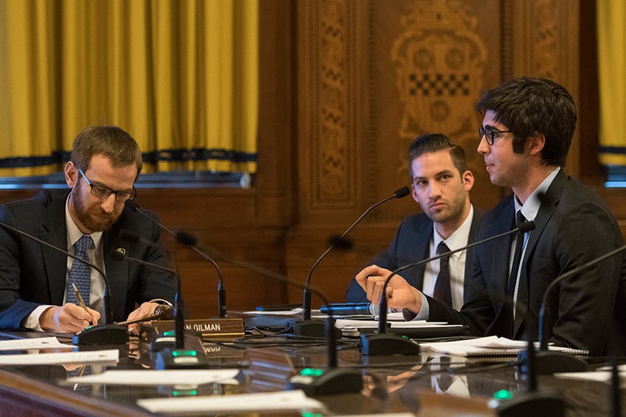 A person speaking at a council meeting