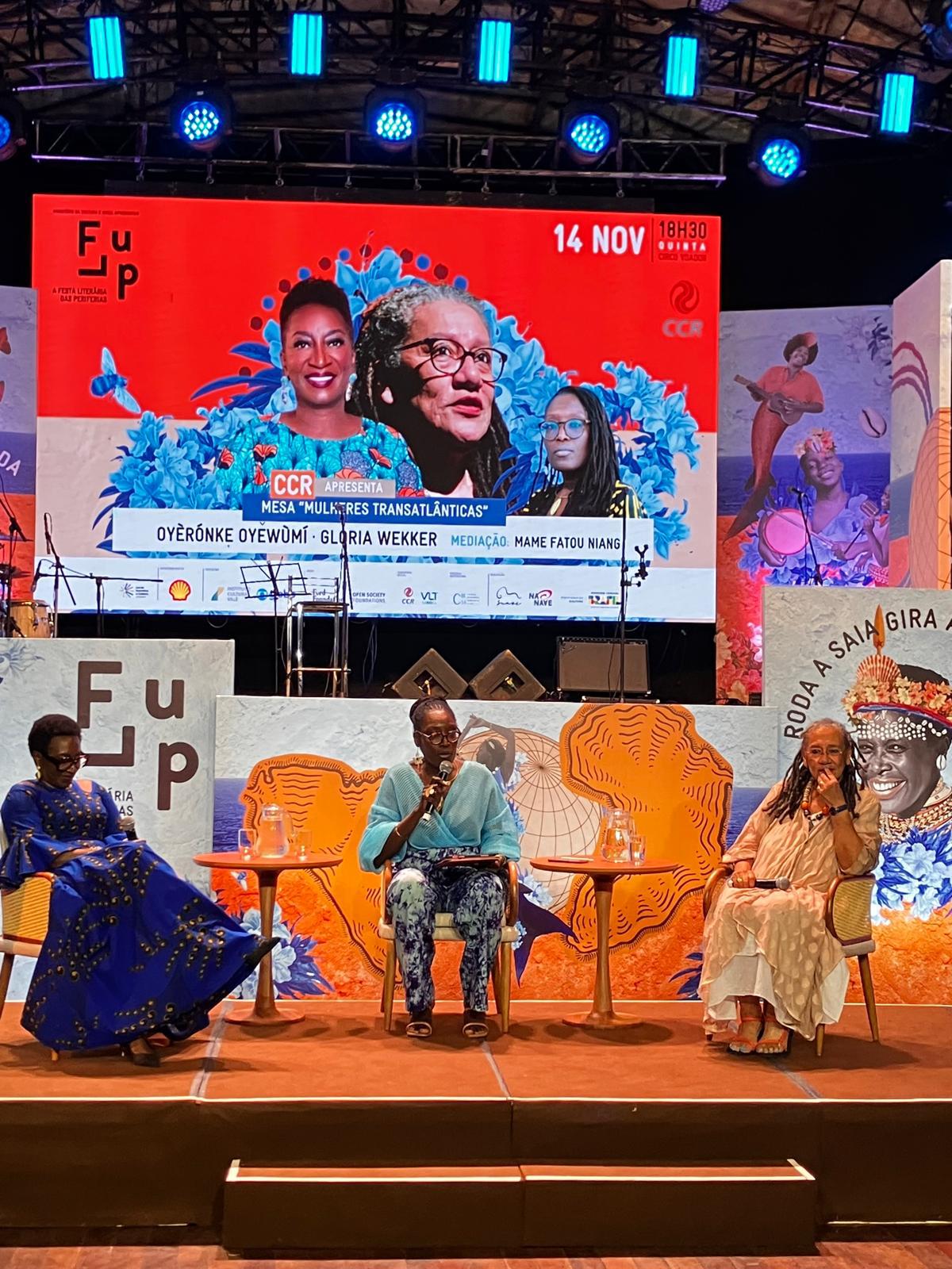 Dr. Niang sitting with Gloria Wekker and Oyeronke Oyewumi
