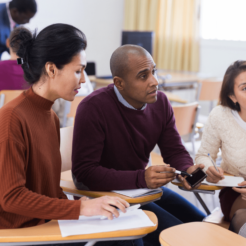 Group of teachers work together