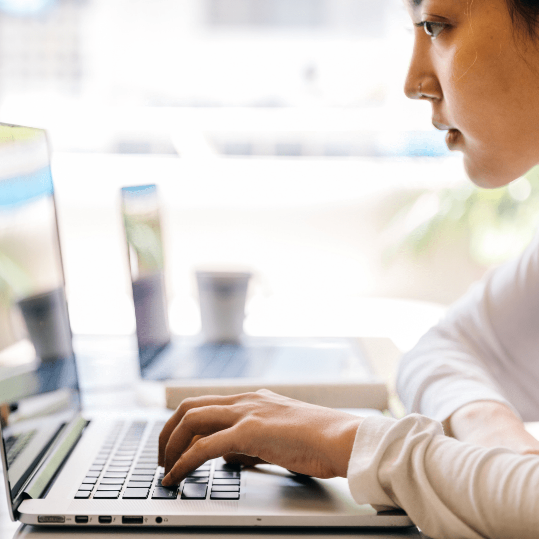 Woman uses laptop