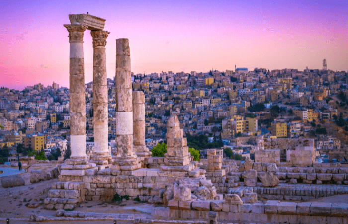 Sunset on Skyline of Amman and old town of the city with nice view over historic capital of Jordan