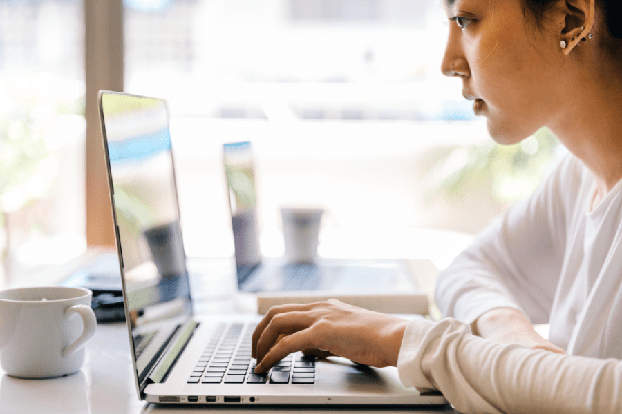 Woman works on a laptop