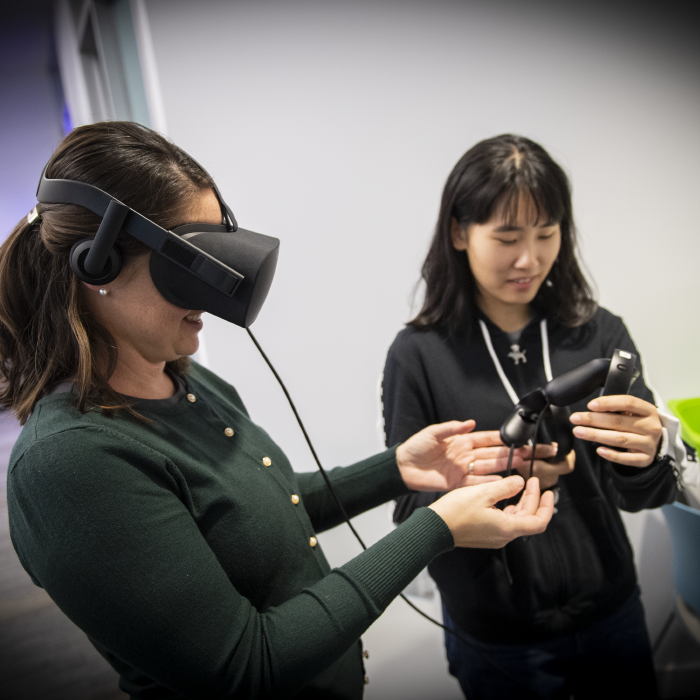 Picture of students using a virtual reality device